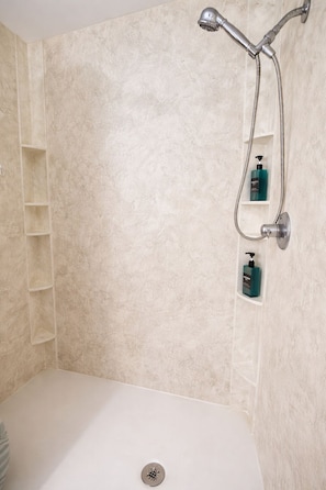 Hair dryer, towels, soap, toilet paper