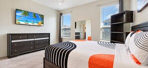 A bedroom with a bed, a dresser, a TV, and a window with blinds. - Modern Retreat near RandolphAFB- Family Friendly, Coffee Bar, WiFi, Yard &Garage (Converse)