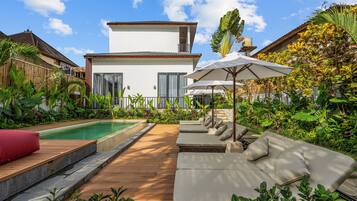 Outdoor pool, pool umbrellas, pool loungers