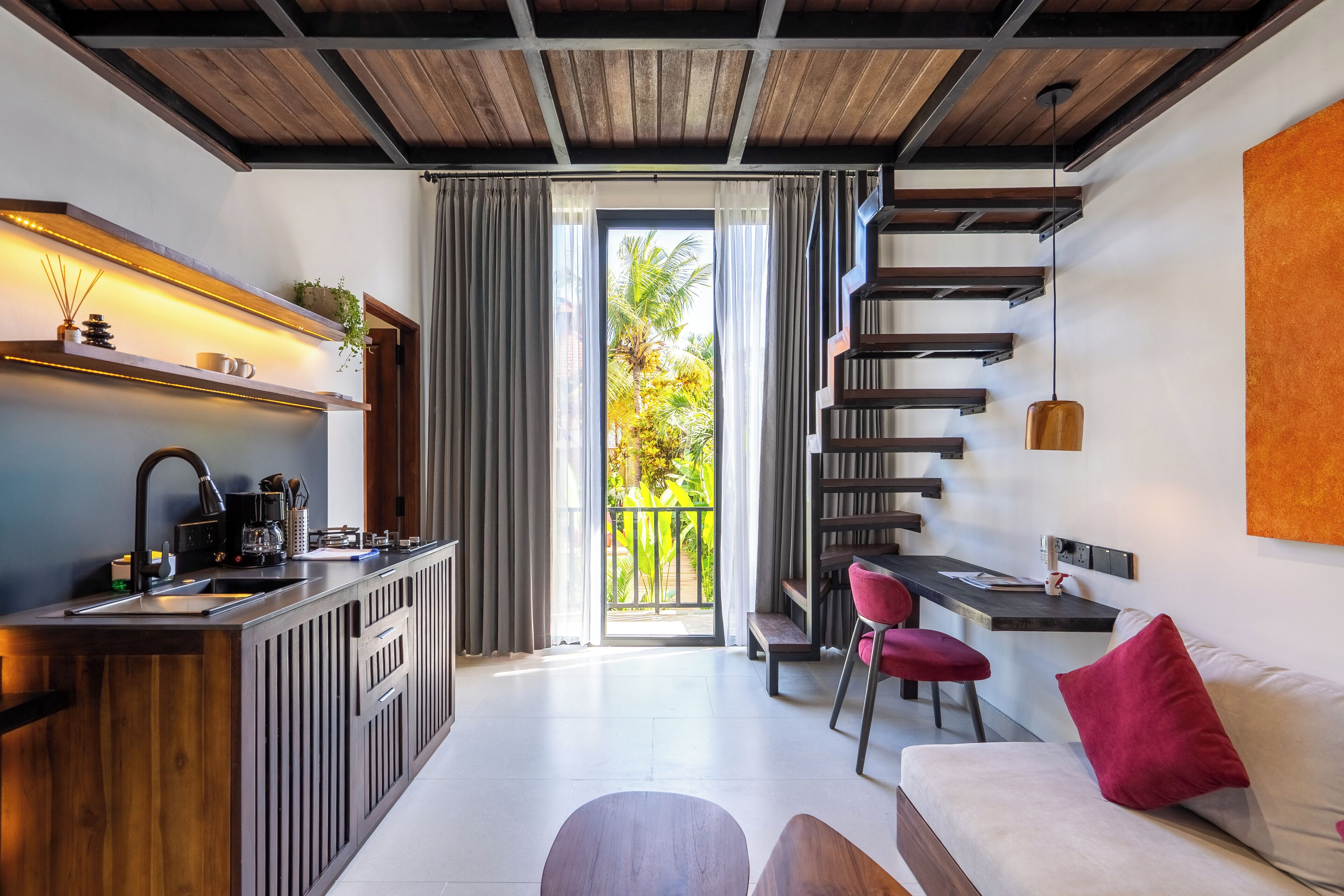 Deluxe Suite, Kitchen, Pool View | In-room safe, desk, laptop workspace, blackout curtains