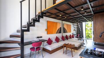 Deluxe Suite, Kitchen, Pool View | Living room