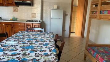 Fridge, stovetop, cookware/dishes/utensils