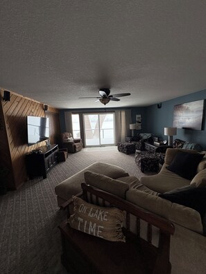 Living area - Lake home with beautiful views, private sandy beach, great location. (Alexandria)