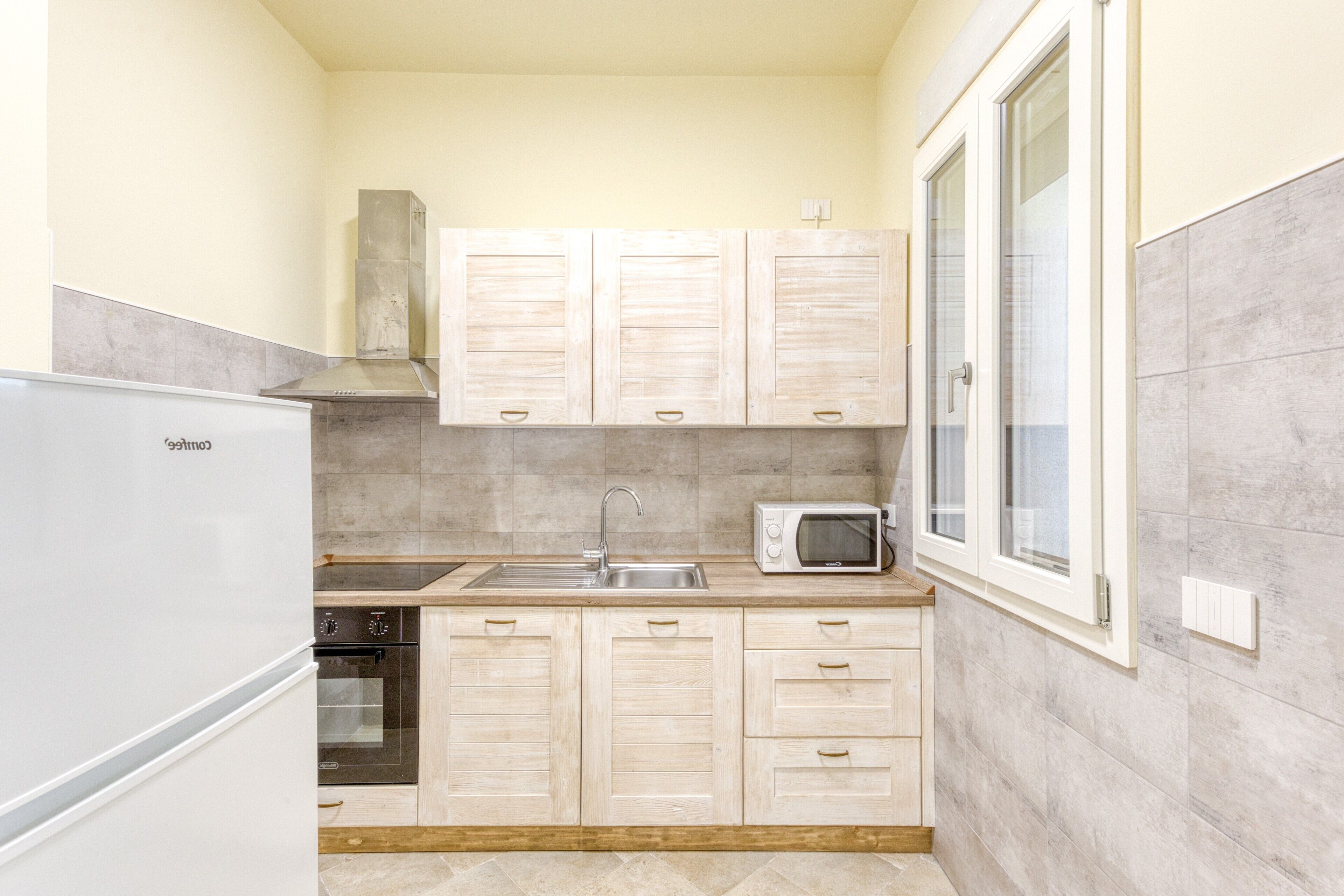 Fridge, stovetop, cookware/dishes/utensils