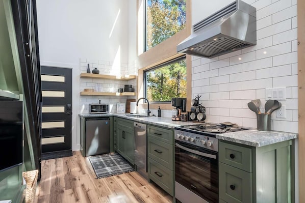 Fridge, microwave, stovetop, coffee/tea maker