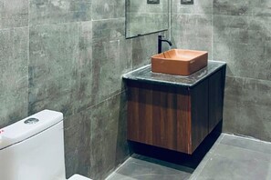 Shower, bidet, towels, soap