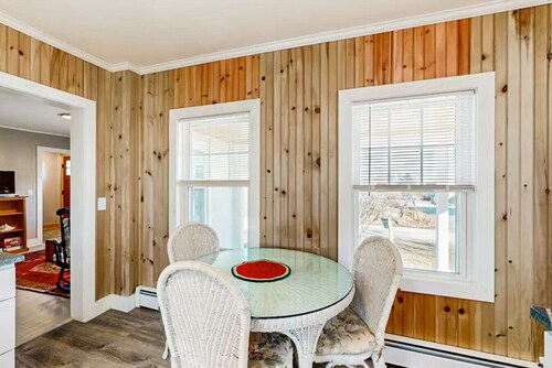 Coastal charm & harbor views just steps from Sand Cove Beach