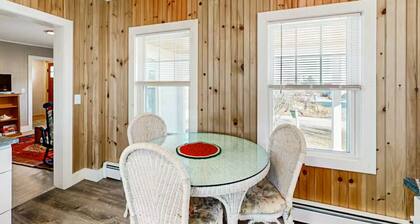 Coastal charm & harbor views just steps from Sand Cove Beach