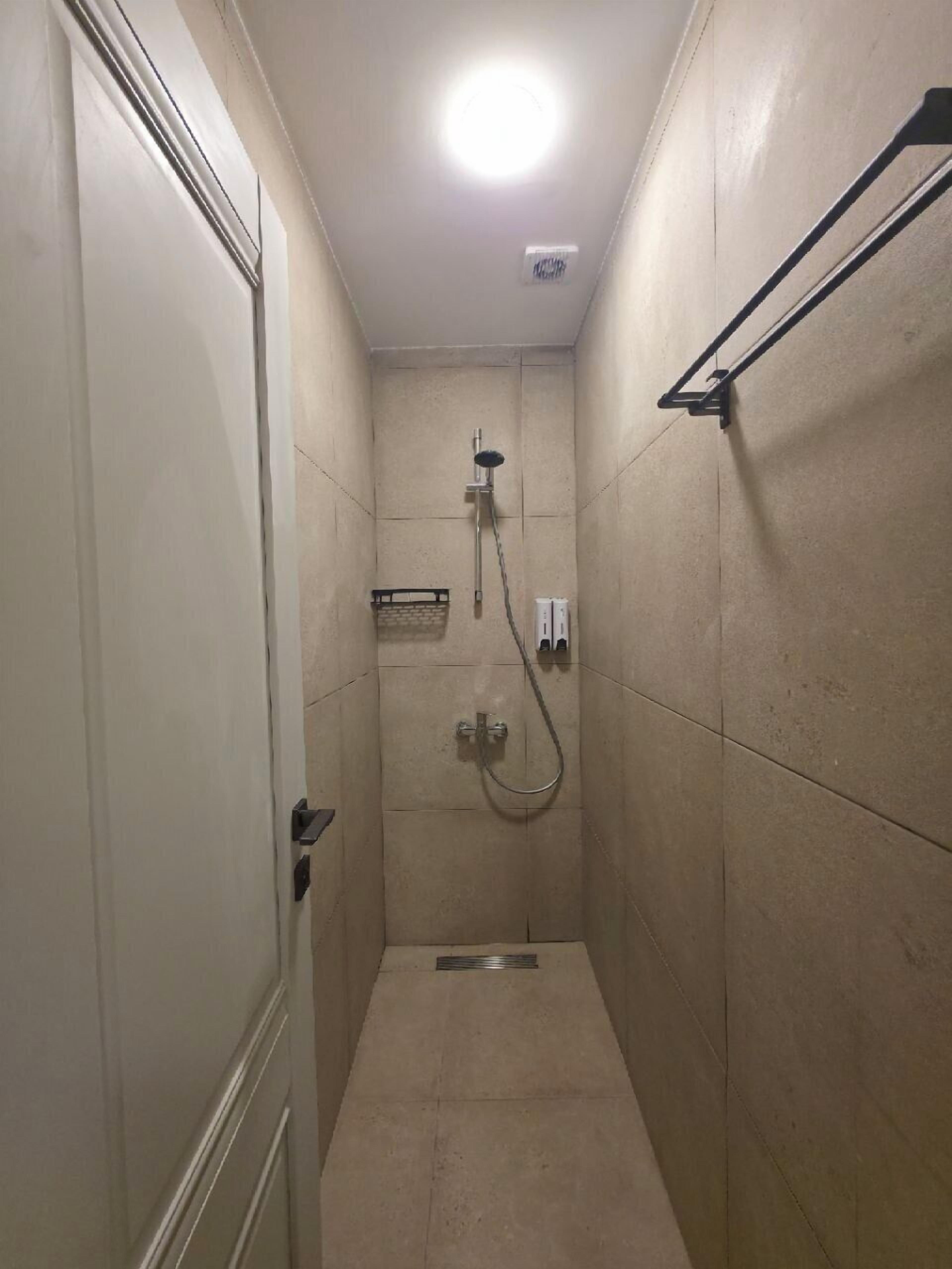 Shower, free toiletries, towels, soap