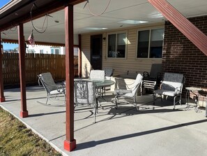 Outdoor dining - Spacious 3BR Ranch Home across from Lake Arbor Park with Private Covered Patio (Arvada)