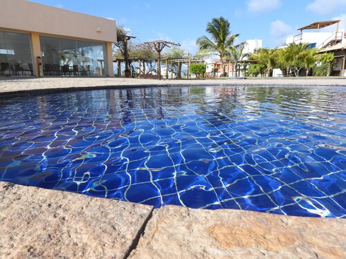 Chalet near the beach, with kitchen and balcony with hammock. Couples and families with children