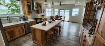 Discover Lake Breezes—an exquisite 1500sqft, 3 bedroom lakeside sanctuary