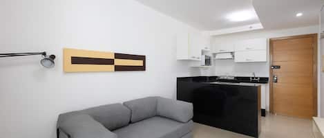 Apartment | Living area | 32-inch Smart TV with digital channels