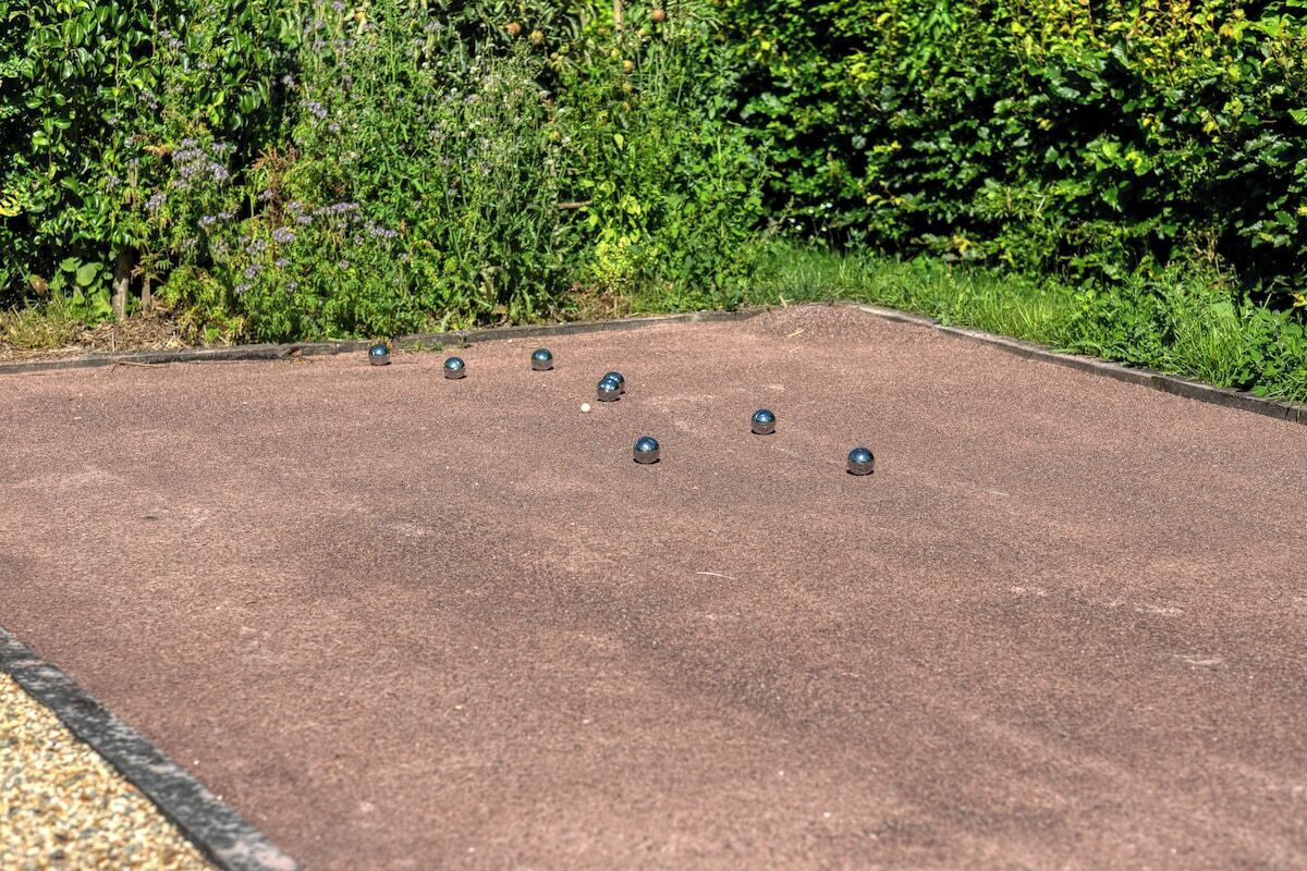 A shuffleboard table with several pucks.