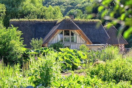 Exterior. Les Chaumières du Manoir | Historic Renovated Farm • Absolute Peace
