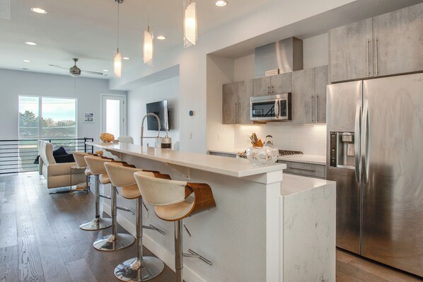 Fridge, microwave, stovetop, dishwasher - Walk to Bars! LoHi City-View Haven w/ Hot Tub (Denver)