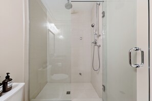 Shower, hair dryer, towels, soap