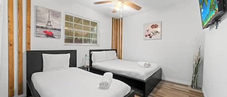 5 bedrooms, desk, iron/ironing board, travel cot
