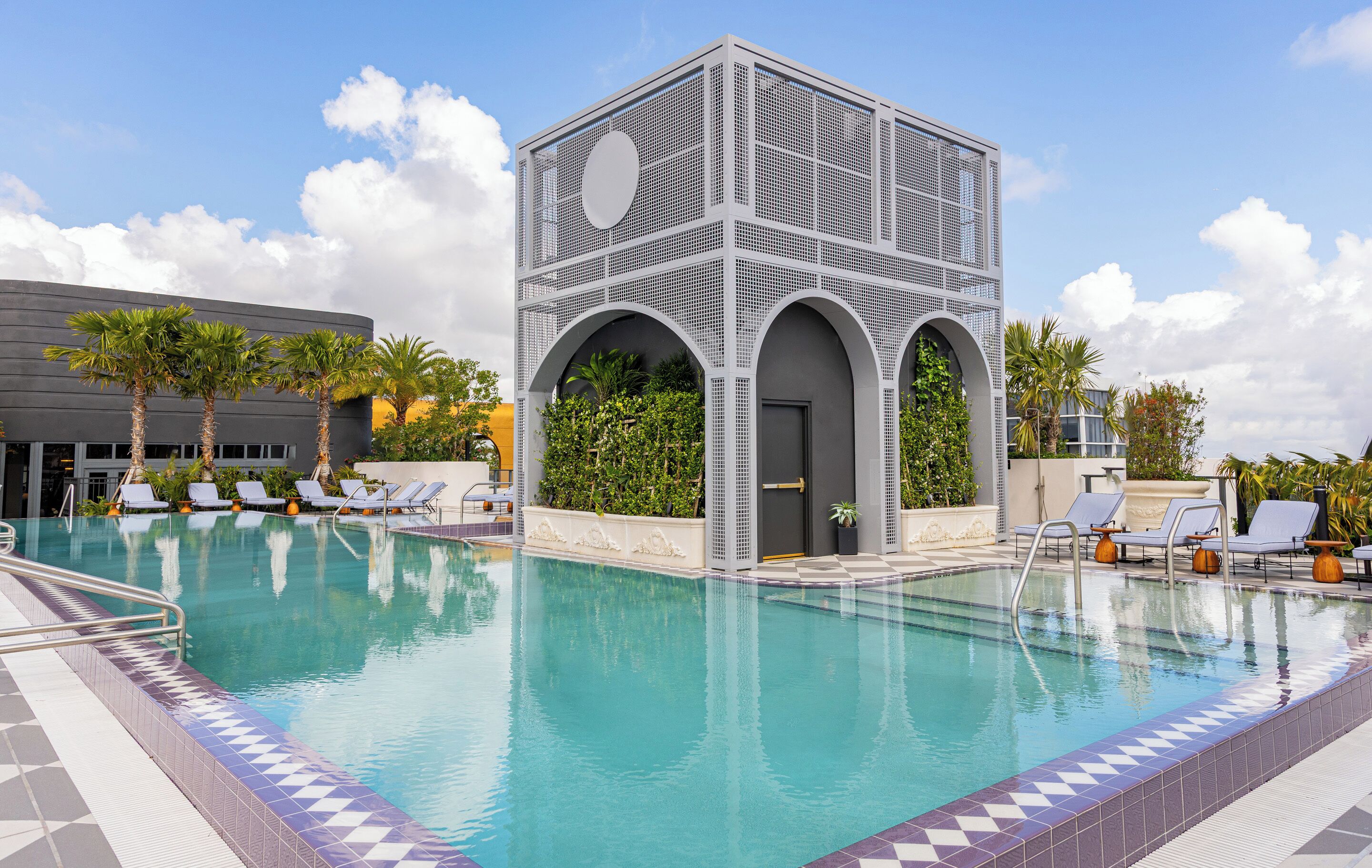 Outdoor pool, open 6:00 AM to 7:00 PM, free cabanas, pool umbrellas