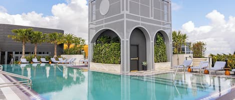 Outdoor pool, open 6:00 AM to 7:00 PM, free cabanas, pool umbrellas