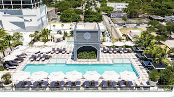 Outdoor pool, open 6:00 AM to 7:00 PM, free cabanas, pool umbrellas