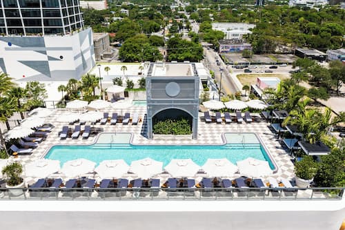 Outdoor pool, open 6:00 AM to 7:00 PM, free cabanas, pool umbrellas