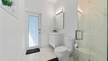 Hair dryer, towels, soap, shampoo
