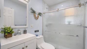 Hair dryer, towels, soap, shampoo