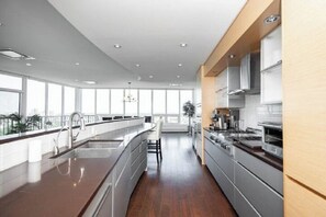 Fridge, microwave, oven, stovetop - Luxury Riverview Penthouse Condo | 2 Bed | 2 Bath | (Winnipeg)