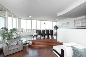 Smart TV, fireplace, computer monitors - Luxury Riverview Penthouse Condo | 2 Bed | 2 Bath | (Winnipeg)