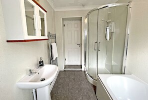 Hair dryer, towels, soap, shampoo