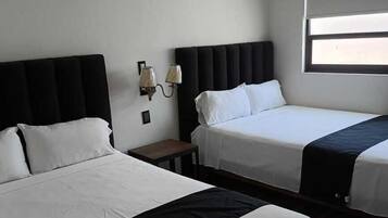 Chambre Quadruple Supérieure | Wi-Fi gratuit, draps fournis