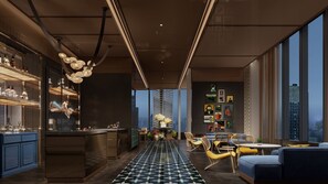 A modern interior with a bar area, seating, and artwork on the walls. - Xiamen Sm City By Ihg (Xiamen)