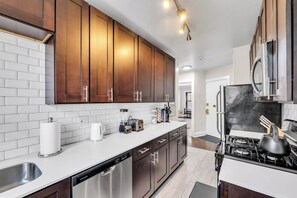 Fridge, microwave, oven, stovetop - Beautifully Remodeled 2B/2BA Hyde Park (Chicago)