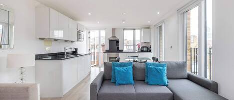 Appartement, plusieurs lits, patio, vue ville (Churchway 8) | Coin séjour