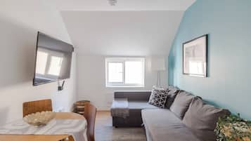 Leilighet, 1 dobbeltseng med sovesofa, kjøkken, byutsikt (Grafton C) | Oppholdsområde