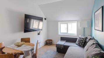 Appartement, 1 tweepersoonsbed met slaapbank, keuken, uitzicht op stad (Grafton C) | Woonruimte