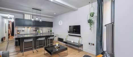 Appartement, 1 trÚs grand lit et 1 canapé-lit, cuisine, vue sur la ville (Long Acre 1) | Aire de séjour
