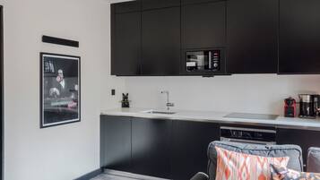 Lejlighed - flere senge - køkken - byudsigt (Old Compton 2) | Privat køkken