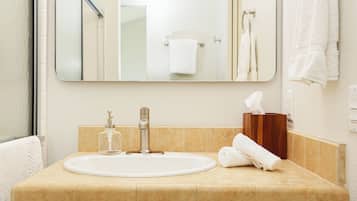 Comfort Cabin, Partial Ocean View | Bathroom | Combined shower/tub, free toiletries, towels, soap