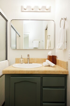Comfort Cabin, Partial Ocean View | Bathroom | Combined shower/tub, free toiletries, towels, soap - Camp Trinidad RV Resort and Cabins (Trinidad)