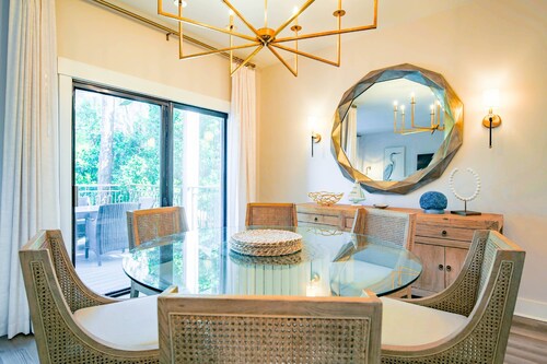 In the Heart of Harbour Town!  Gorgeous, End Unit Townhome w/ Community Pool & Outdoor Balconies!