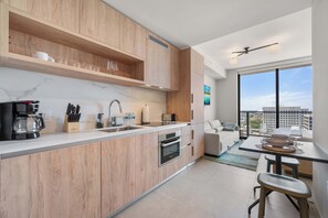 Fridge, microwave, oven, stovetop - Balcony Studio at The Crosby-Miami Worldcenter (Miami)