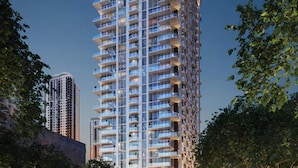 Un immeuble de grande hauteur doté de nombreux balcons, probablement un hôtel ou un complexe résidentiel.