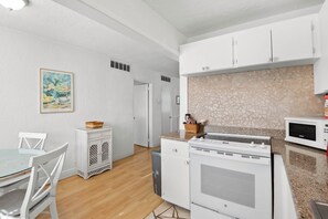 Fridge, microwave, oven, stovetop - 🌅 Private Rooftop Deck Retreat | 2BR Coastal Condo at Gulf Winds Resort (Saint Pete Beach)