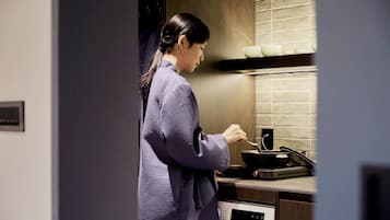 Mini-fridge, microwave, stovetop, dining tables