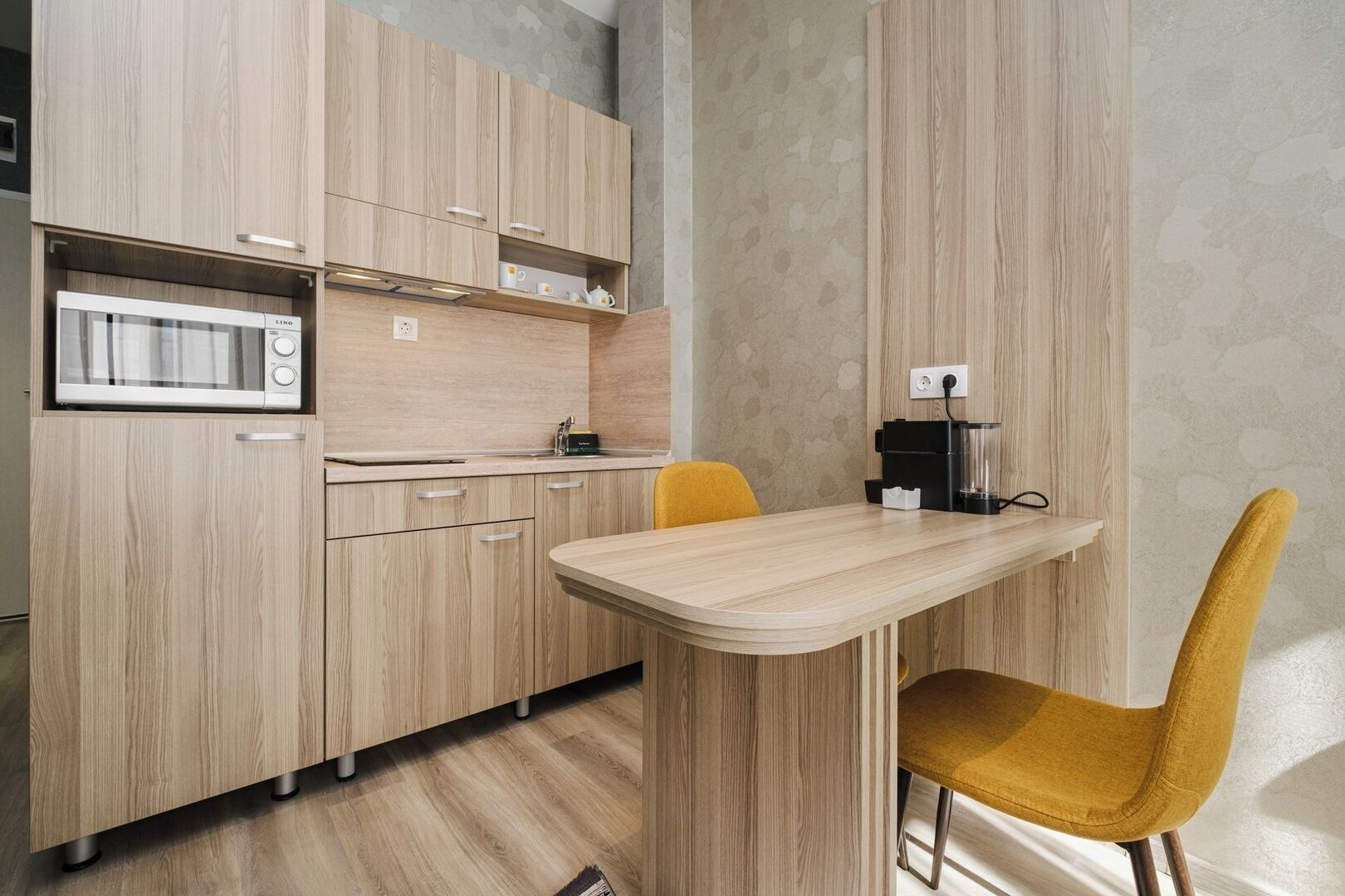 Fridge, microwave, stovetop, coffee/tea maker