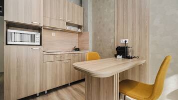 Fridge, microwave, stovetop, coffee/tea maker