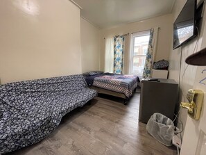 1 slaapkamer, een strijkplank/strijkijzer, wifi, beddengoed