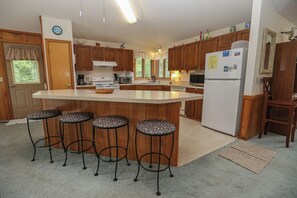 Fridge, microwave, oven, stovetop - HappyTauk - 4 BR Home Near Beach w/Private Pool - Dogs Allowed (Southern Shores)